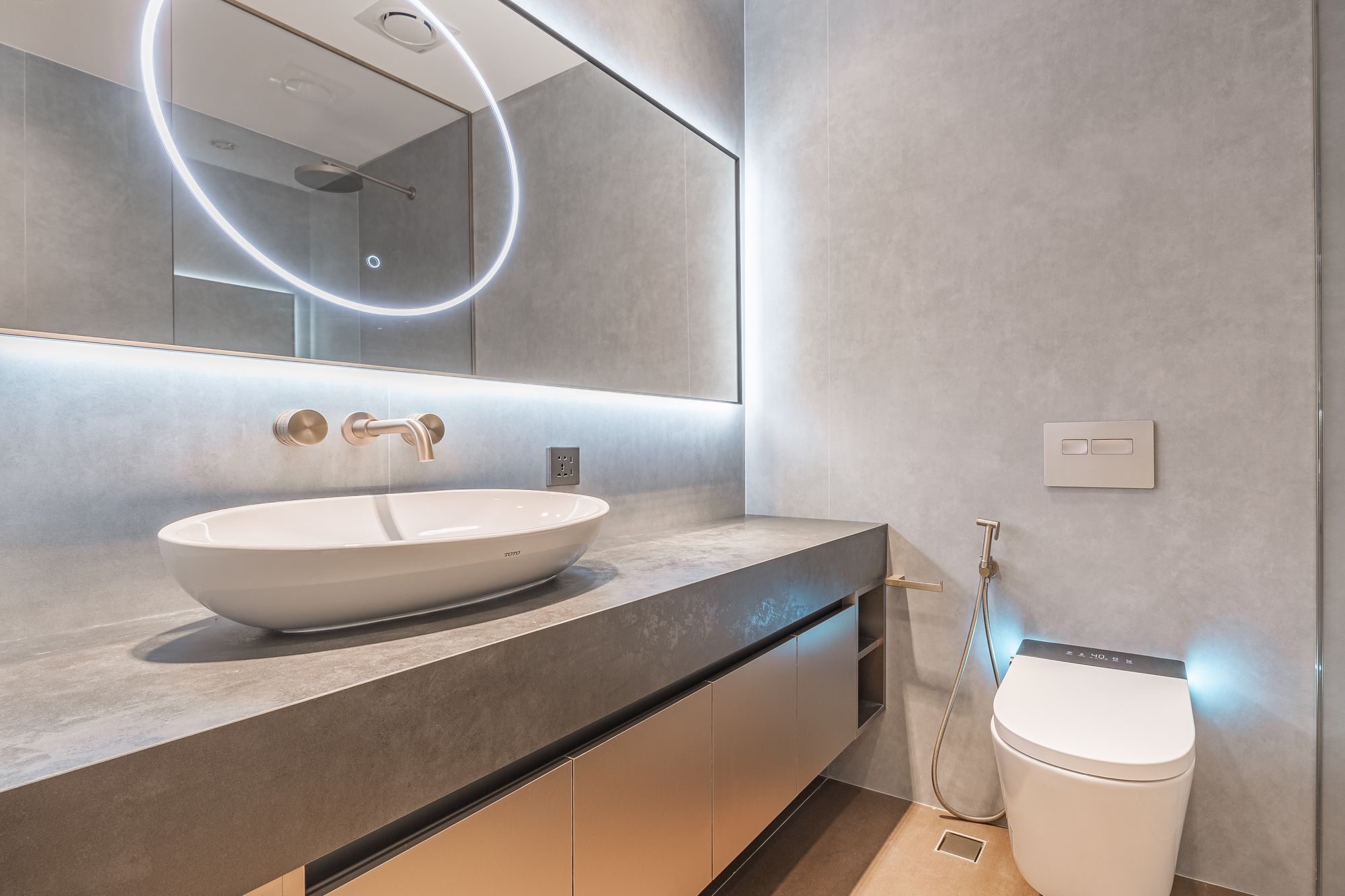 Concrete & gold powder room