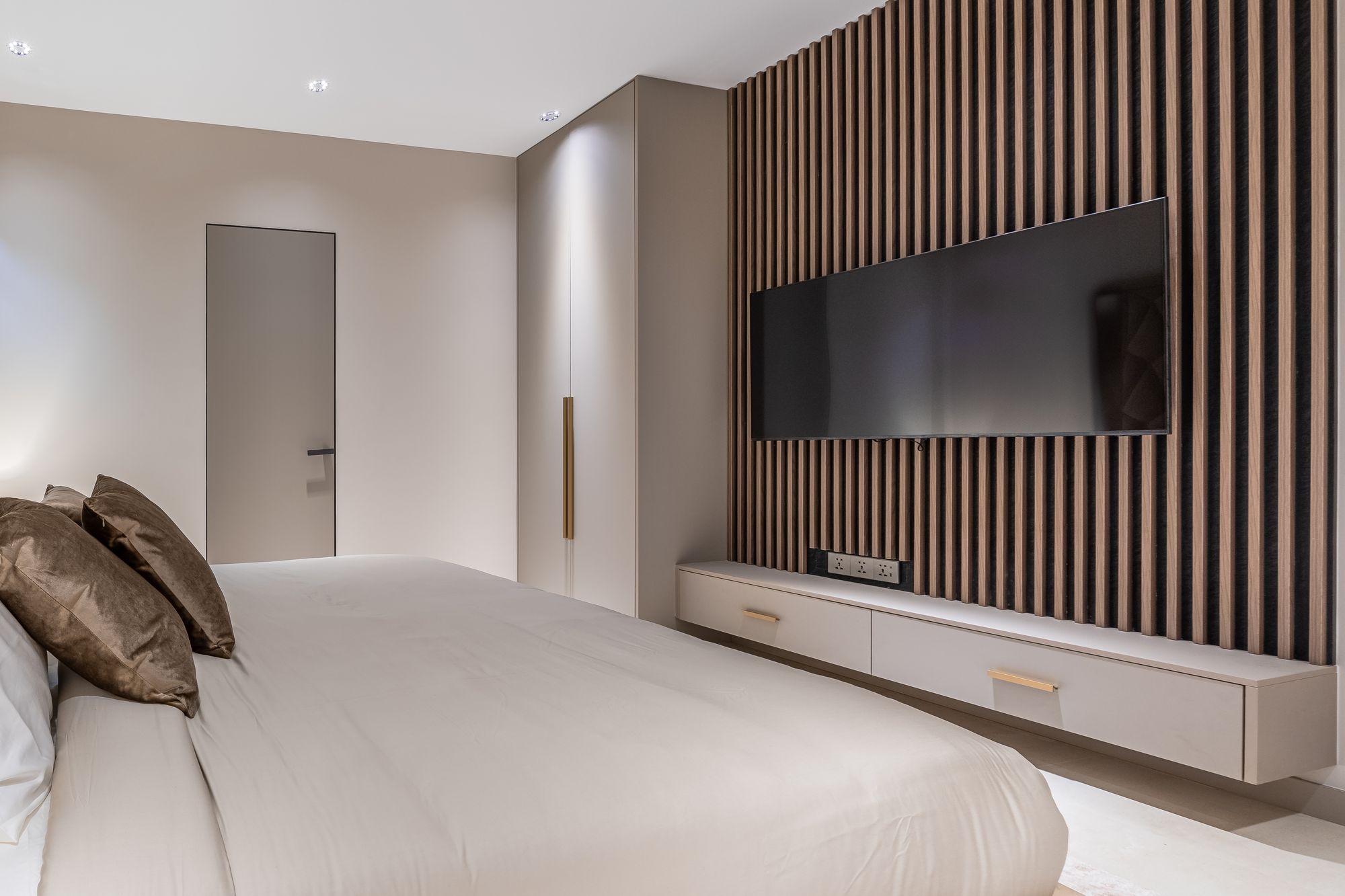 Grey feature-wall bedroom